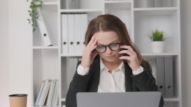 Business woman worried, listening to sad, bad news on the phone. Negative emotions. Head of Finance, carefully studying reports and analyzing the economic performance of her company. High quality 4k - Footage, Video