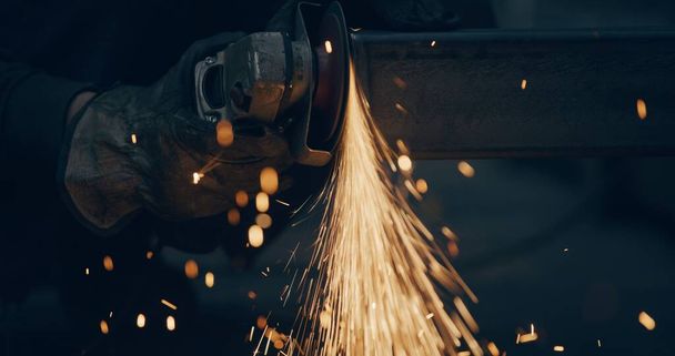 Close Up Of Sparks Cutting At Metal Industry Workshop. Grinding Metal Sparks Steel Cutting At Industrial Workshop - Photo, Image
