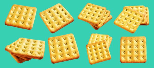 Craquelins carrés isolés ou biscuits, biscuits au beurre avec chemin de coupe, pas d'ombre dans le fond vert - Photo, image
