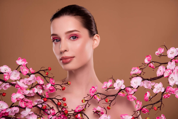 Photo of hot stunning gorgeous lady in sakura cherry branch garden advertising tradition beauty procedure therapy. - Фото, изображение