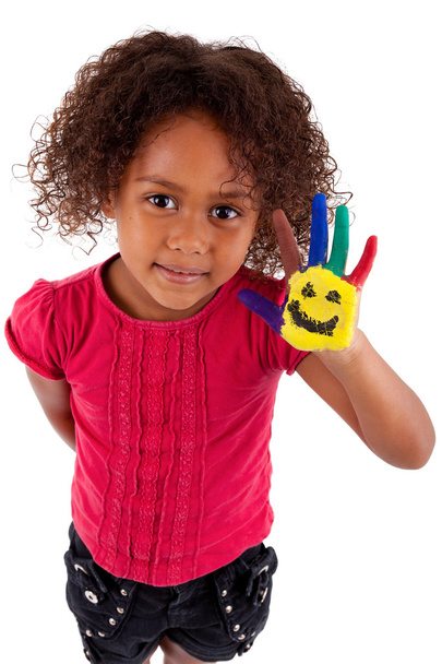 Little African Asian girl with painted hands - Foto, afbeelding