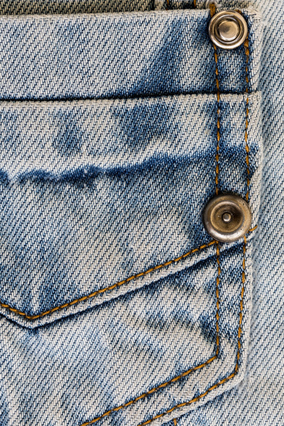 Jean shirt with pocket and metal button on clothing textile - Photo, Image