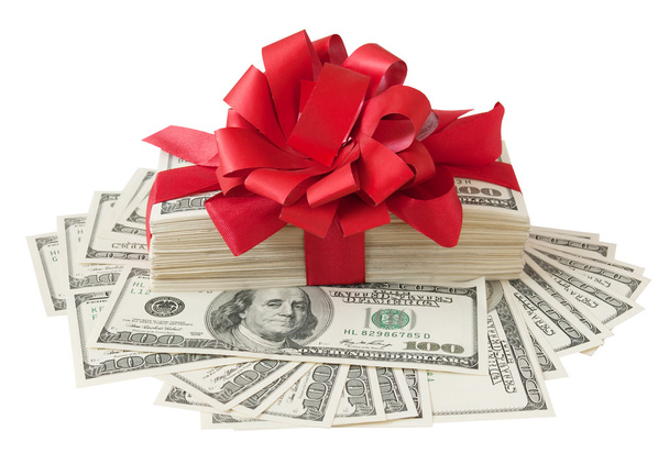 Un regalo. Bono de dinero. Pila con dinero con lazo rojo aislado sobre fondo blanco con texto de muestra
 - Foto, Imagen