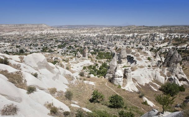 View of the village of Goreme in Cappadocia, Anatolia region of Turkey, on a sunny summer day, panorama - Photo, Image