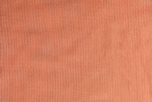 Perzik getextureerde stof, kleur van het jaar 2024 Perzik Fuzz achtergrond - Foto, afbeelding