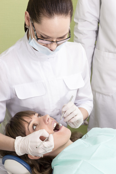Female dentist and patient - Fotó, kép
