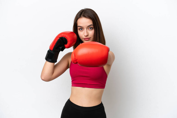 Young Ukrainian woman isolated on white background with boxing gloves - Фото, зображення