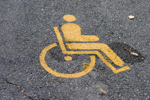 Yellow road marking for disabled and invalid parking - Photo, Image