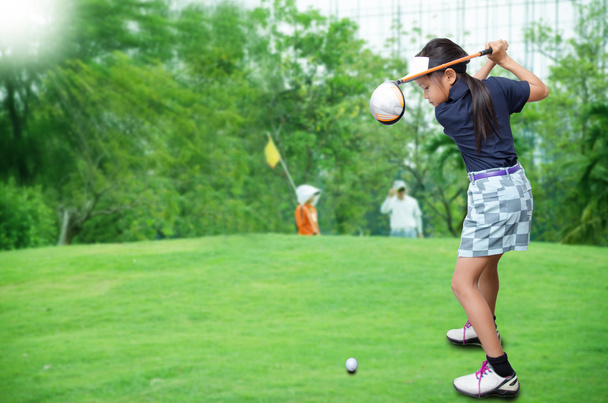 Little asian girl playing golf  - 写真・画像