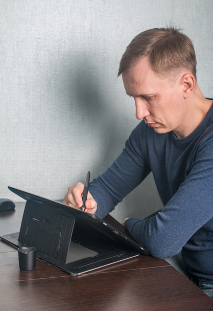 Man using digital tablet and computer - Photo, Image