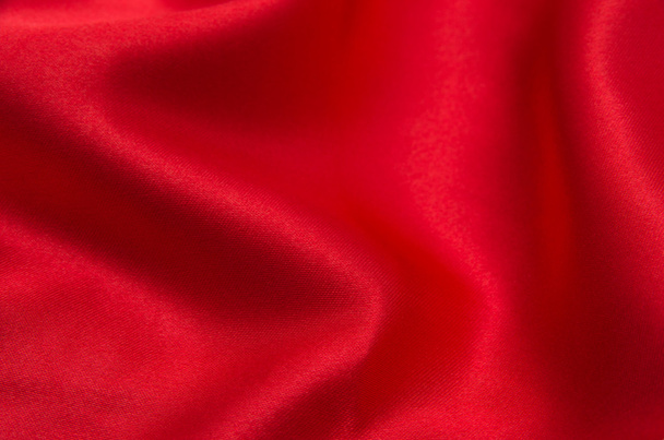Tejido rojo satinado o de seda como fondo - Foto, Imagen