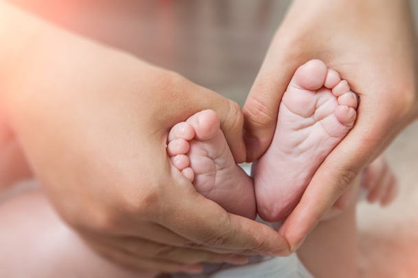 Baby 's feet
 - Фото, изображение