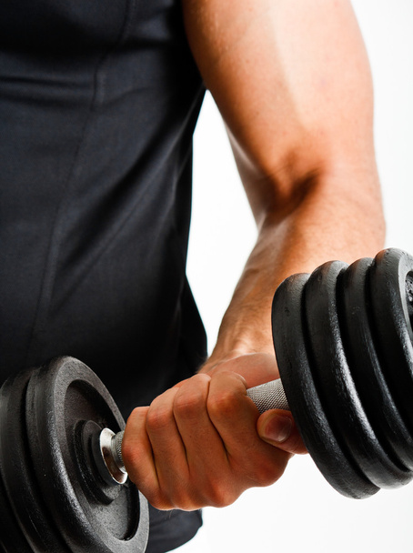 Athlete lifting weights - Фото, изображение