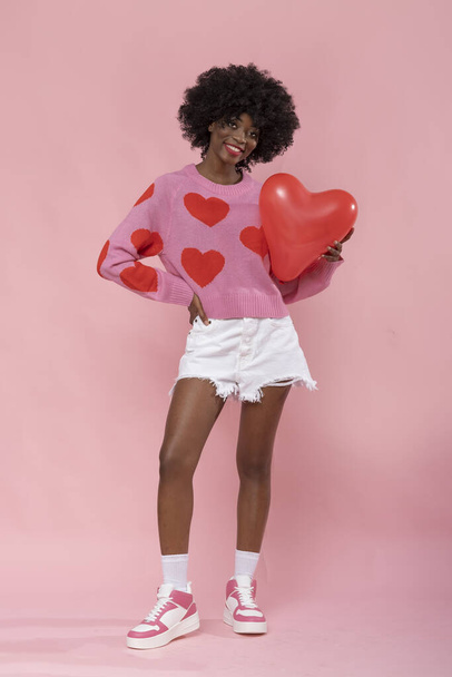 Happy afro american woman with balloon heart. - Fotó, kép