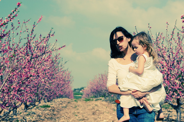 Mother and daughter in the park - Photo, Image