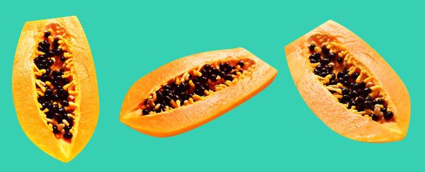 Papaya ripe fruit isolated with clipping path in green background, no shadow, healthy tropical fruit, half and slice, piece - Photo, Image