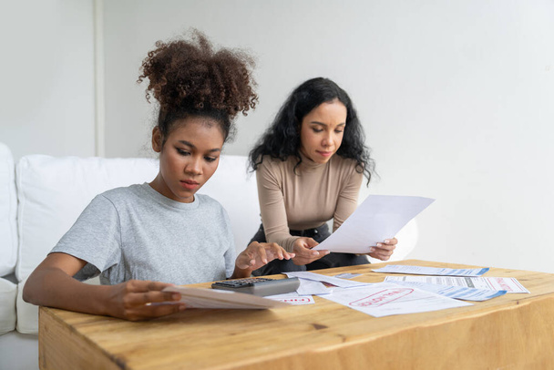 Stressed African American women has financial problems with credit card debt to pay crucial show concept of bad personal money and mortgage pay management crisis. - Foto, immagini