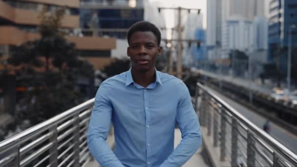 Portrait of the Young Successful Businessman Posing for the Camera Standing Outside, Wearing a Blue Shirt with Crossed Arms. Handsome Boss Outdoors Looking at the Camera. People and Business Concept - Footage, Video