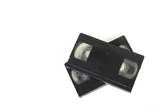 Две видеокассеты на белом фоне. - Фото, изображение
