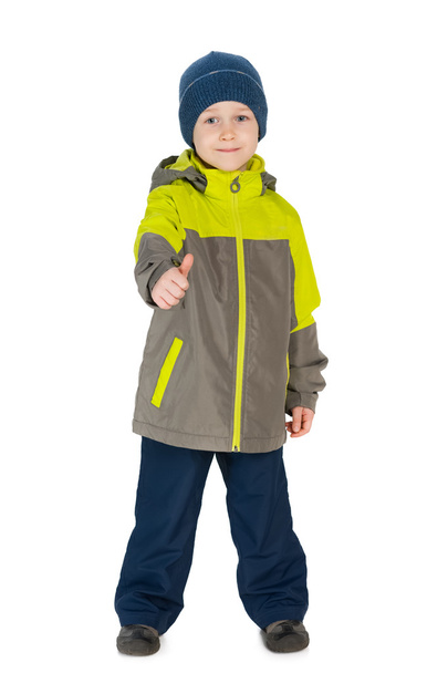 Niño en una chaqueta sostiene su pulgar hacia arriba
 - Foto, Imagen
