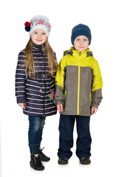 Fashion children in the winter jackets - Foto, imagen
