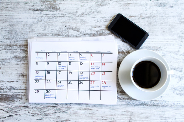 Comprobación de actividades mensuales en el calendario
 - Foto, imagen