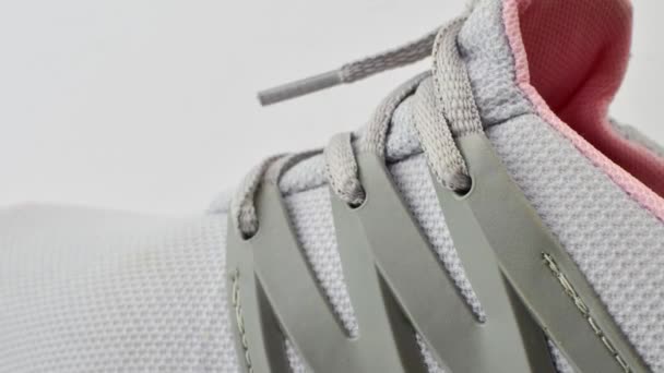 Detailed view of running shoes, perfect for walks, combining exceptional style and comfort. Close-up of running shoes, blending style and technology for a unique walking experience. - Footage, Video