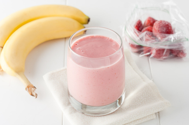 homemade banana and frozen strawberry smoothie - Photo, Image