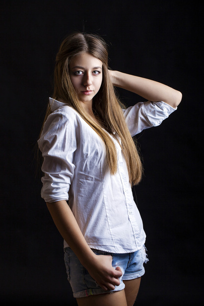 Young attractive girl in casual style, Isolated on black backgro - Photo, Image