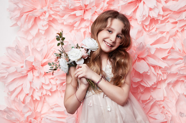 Beautiful little girl in cute dress with flower - Fotoğraf, Görsel