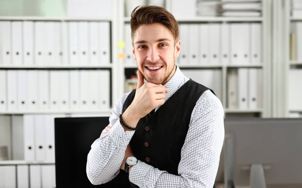 Handsome man in suit and tie stand in office looking in camera hands crossed on chest. White collar dress code modern office lifestyle graduate college study profession idea coach train concept - Photo, Image