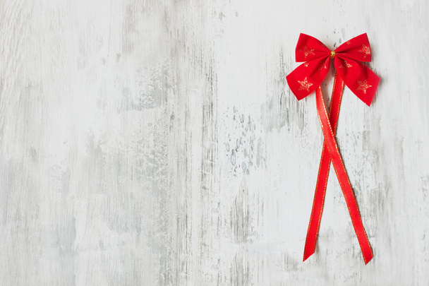 festive red bow with a ribbon  - Photo, Image