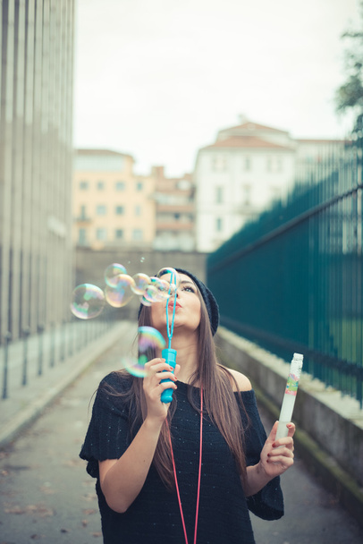 beautiful  girl blowing bubbles - Photo, Image