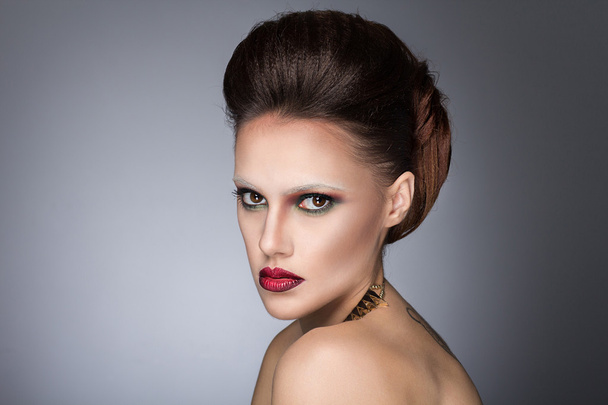Beauty Fashion Model brutal Girl with make-up, close-up studio shoot - Photo, Image