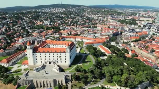 Drone flying at Bratislava Castle or Bratislavsky Hrad. Bratislava Castle is the main castle of Bratislava, capital of Slovakia. Aerial view of city skyline from drone. High quality 4k footage - Footage, Video