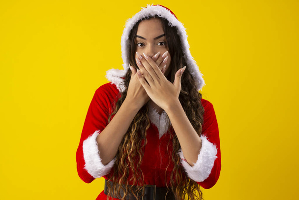 Happy young woman dressed as Santa Claus - Photo, Image