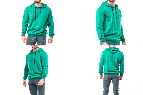 Egy férfi zöld kapucnit visel. Utcai viselet modellje logó nyomtatáshoz. A férfi kapucnis pulóver elülső és hátsó nézete. - Fotó, kép