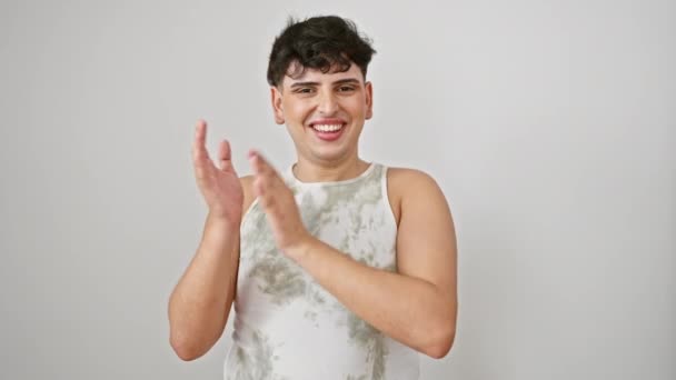 Cheerful young man, gay and proud, in sleeveless t-shirt applauding happily with joy. standing and expressing congratulations and success. isolated on a white background. - Footage, Video