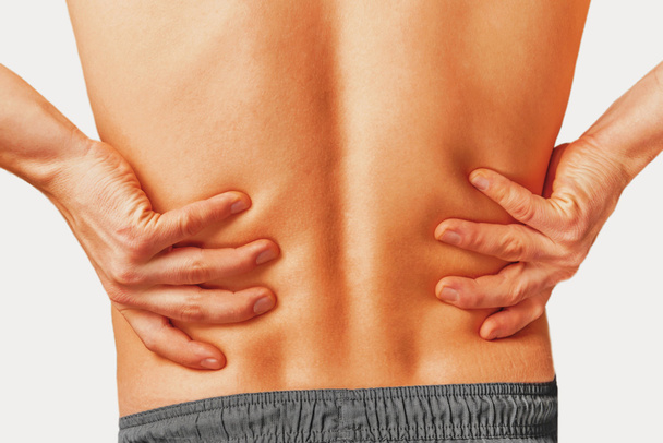 Acute pain in back - Valokuva, kuva