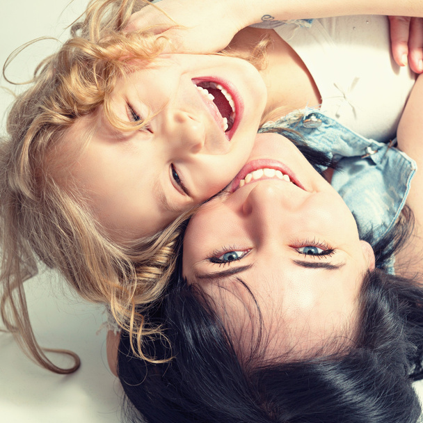 Woman and child. Portrait of happy mother and daughter. - 写真・画像
