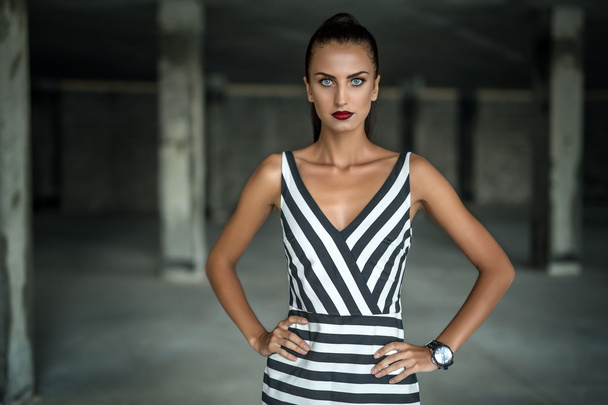 Fashion model in a striped dress - Foto, Imagem