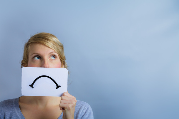 Unhappy Portrait of someone Holding a Sad Mood Board - Photo, Image