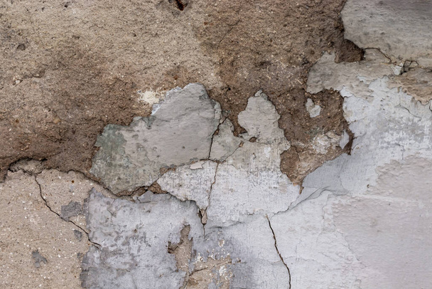 texture d'un vieux mur recouvert de peinture pelante - Photo, image