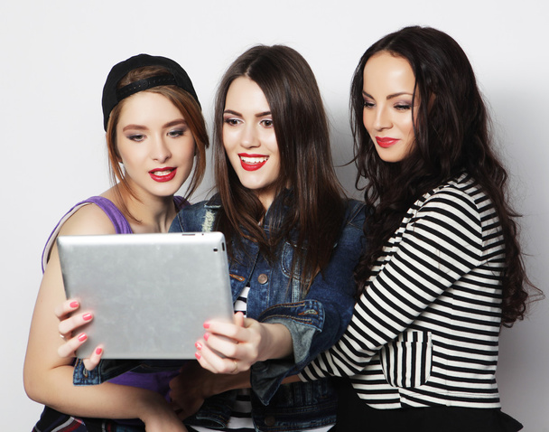 girls friends taking selfie with digital tablet - 写真・画像
