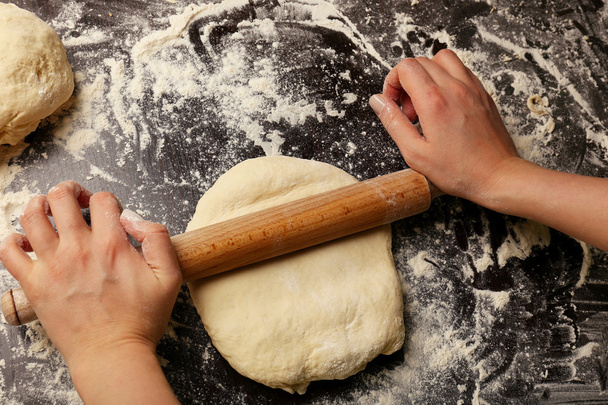 Making dough by female hands - Foto, Imagen