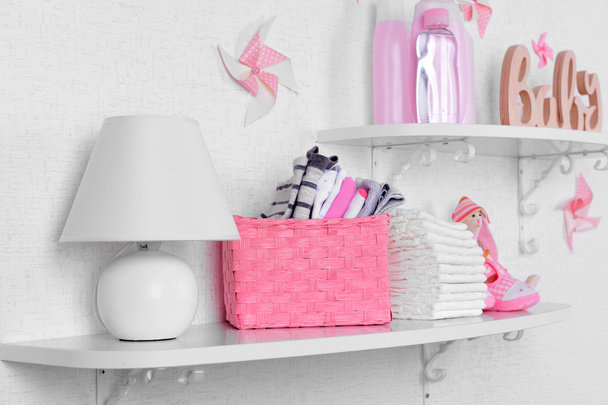 Baby accessories on shelves close-up - Foto, imagen