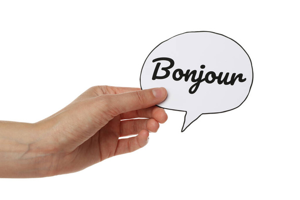 PNG woord bonjour in de hand geïsoleerd op witte achtergrond. - Foto, afbeelding