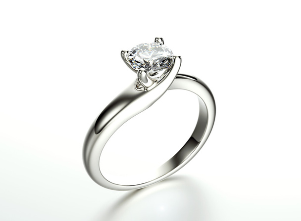 Złoty pierścionek zaręczynowy z diamentów. Biżuteria tło - Zdjęcie, obraz