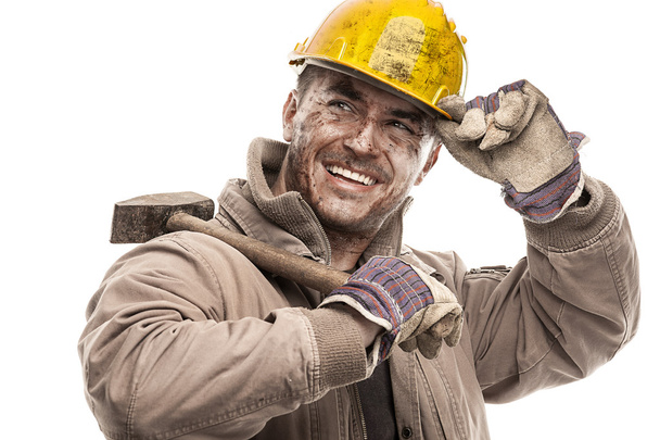 sujo trabalhador homem com Difícil chapéu capacete
 - Foto, Imagem