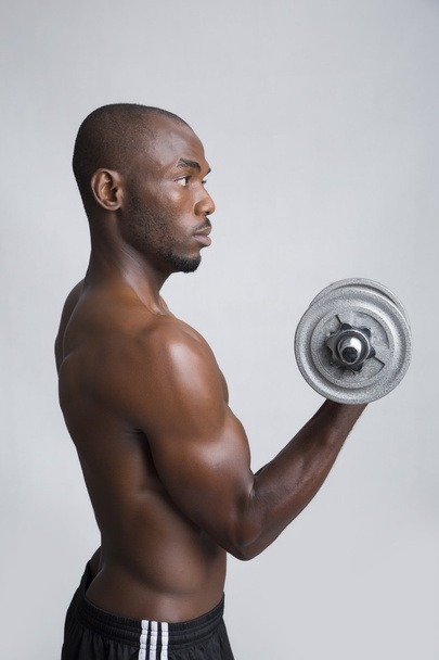 Man lifting weights - Foto, imagen